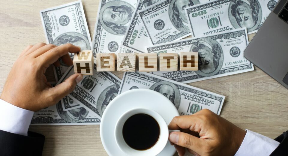 Wealth to Health Inscription with Dollar Bills